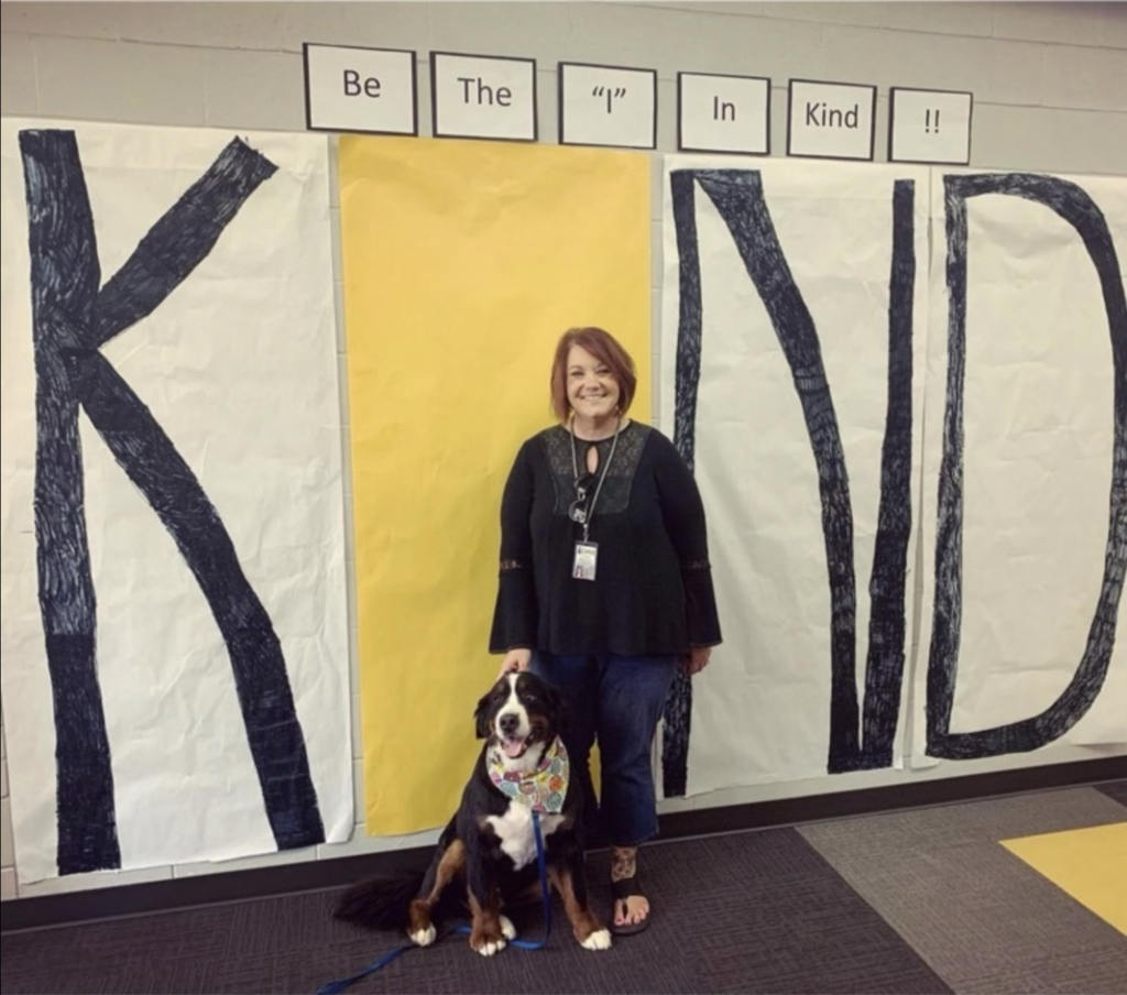 Christie Henderson and Sam the therapy dog "Be the I in Kind"