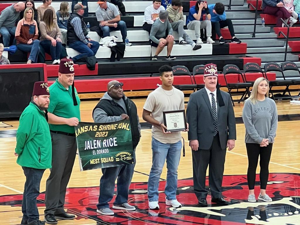 EHS student Jalen Rice with his parents Reggie and Dena Rice and representatives from Midian Shrine